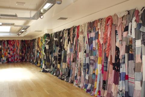 Vessels - Title: Vessels of Strength: She – Her – Womb – Warrior (2022)  Solo Exhibition: Vessels of Strength: She – Her – Womb - Warrior  Venue: Excel Gallery, Tipperary.  Medium: 365 Handstitched Textiles constructed from pre-worn women’s clothing. Dimensions: Spanned the perimeter of the gallery ( L: 64ft  W: 19ft approx..)