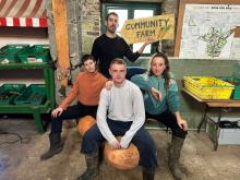 4 young people sitting on pumpkins - Sophie Coote
